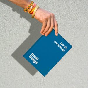 Hand holding a book