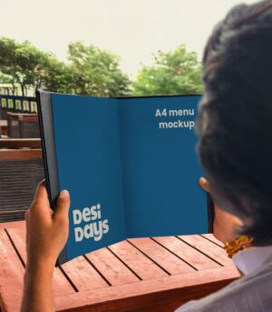 Man Holding a Menu