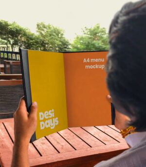 Man Holding a Menu
