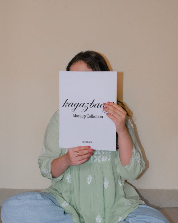 girl-hiding-behind-an-a4-paper-2